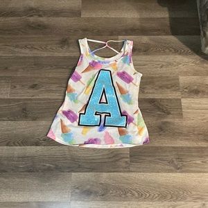 Justice ice cream shirt with letter A in the center